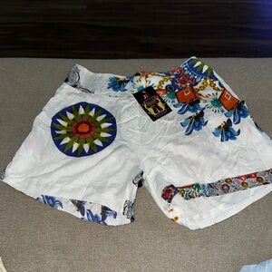 White Flat Front Shorts with Geometric Patterns